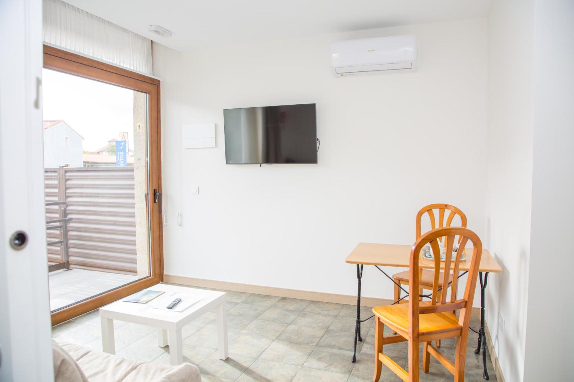 Apartamentos Playa De Cóbreces Kültér fotó