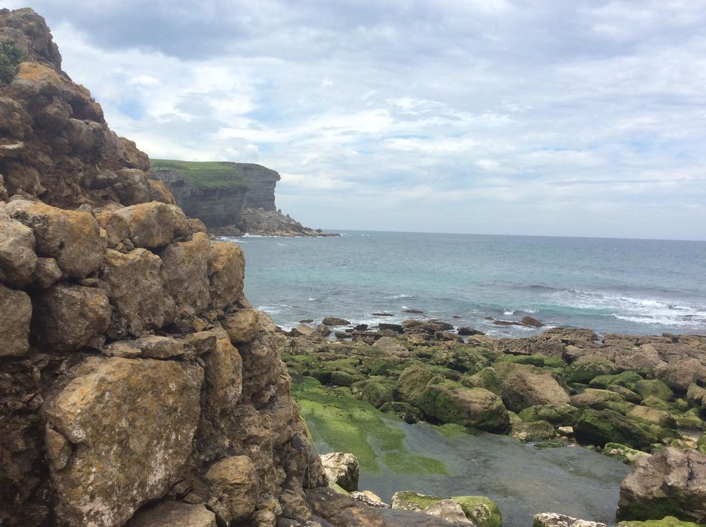 Apartamentos Playa De Cóbreces Kültér fotó