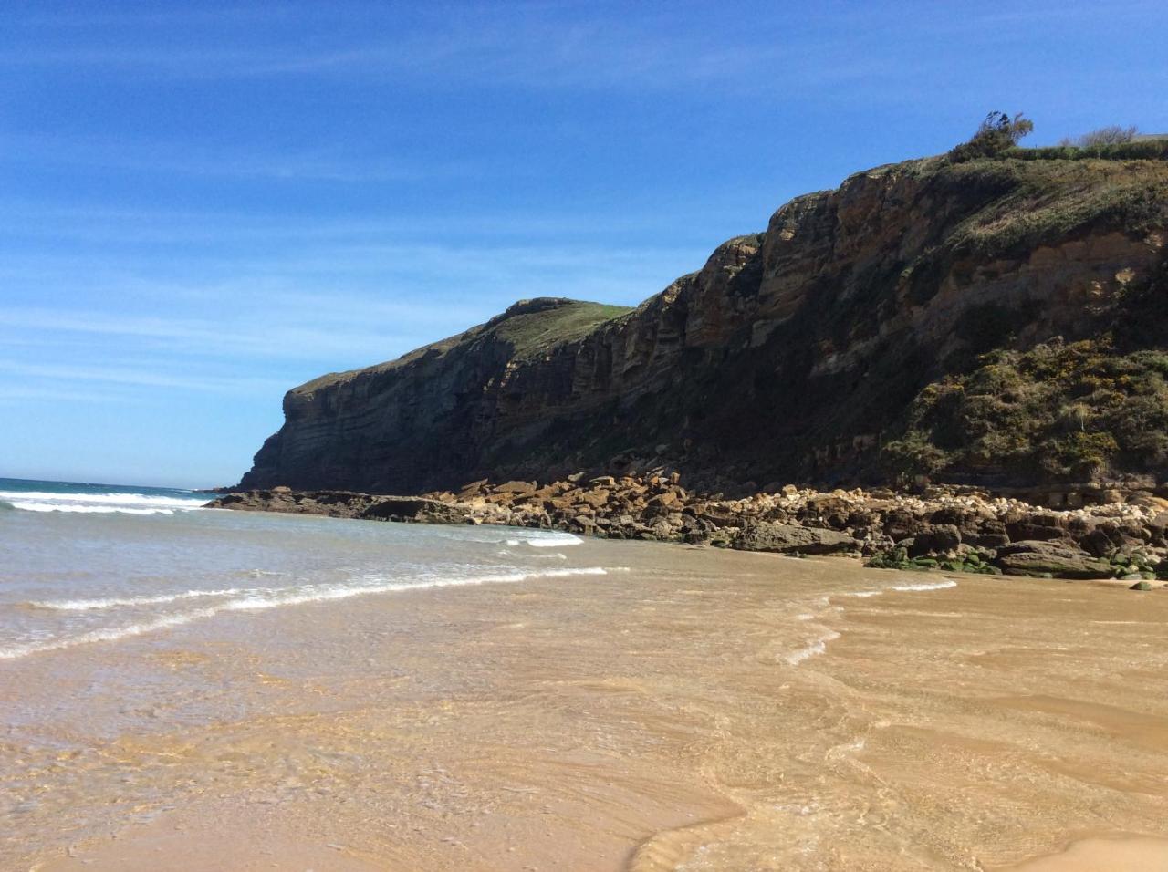 Apartamentos Playa De Cóbreces Kültér fotó